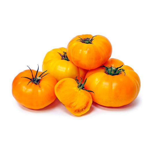 Imagen de un tomate Brandywine amarillo en primer plano: "Tomate Brandywine amarillo de gran tamaño, con una forma ligeramente irregular y un color amarillo dorado brillante. La superficie del tomate es suave y muestra un aspecto jugoso.